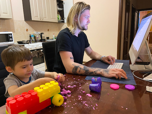 Andrii working with his family.