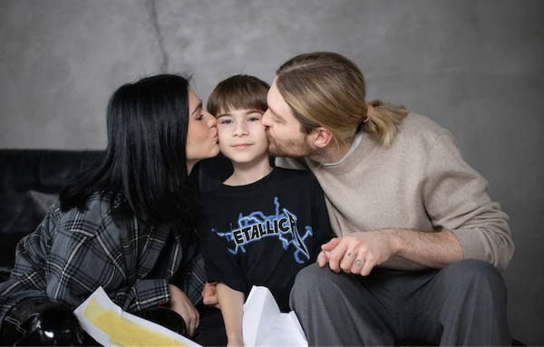 Andrii with his family.