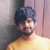 Nikhil C.