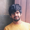 Nikhil C.