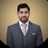 Talha A.