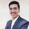 Nikhil C.