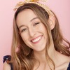 Angela M.