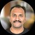 Mahesh T.