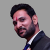 Sanjay B.
