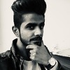 Muzaffar R.