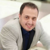 Mustafa E.