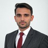 Naeem K.