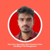 Dinesh B.