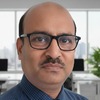Shyam B.