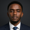 Manasseh T.