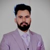 Munish K.