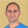 Mahesh T.
