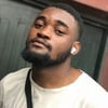 Ayinde E.