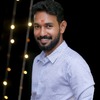 Dinesh B.