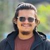 Minhaj U.