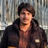 Malik Taj K.