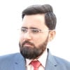 Ali E.