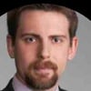 Adam E.