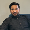 Naveen K.