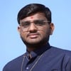 Jignesh K.