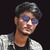 Dinesh B.
