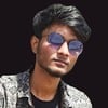 Dinesh B.