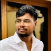 Naresh E.