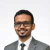 Akram  A.