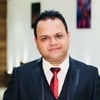 Rajneesh K.
