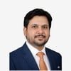 Shahbaz K.
