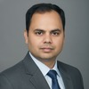 Naveen K.
