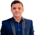 Nidhish B.