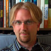 Mark E.