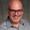 Jason E.