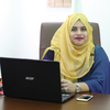 Nazma K.