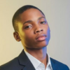 AKINOLA E.