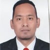 Dinesh B.