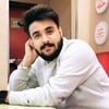 Naveen K.