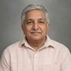 Ashok G.