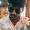 Nikhil C.