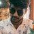 Nikhil C.