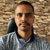 Naveen K.
