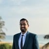 Dinesh K.