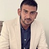 Jogesh R.