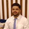 Manoj T.