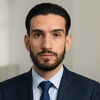 Hassan E.