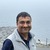Dinesh M.