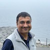 Dinesh M.
